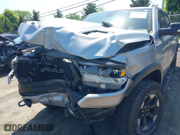 2019 Ram 1500 Rebel with VIN 1C6SRFLT8KN797618, listed as a IAAI auction lot 42556663 with 92,606 mi miles and . Bid and sale history available at DreamBid. Image 6.