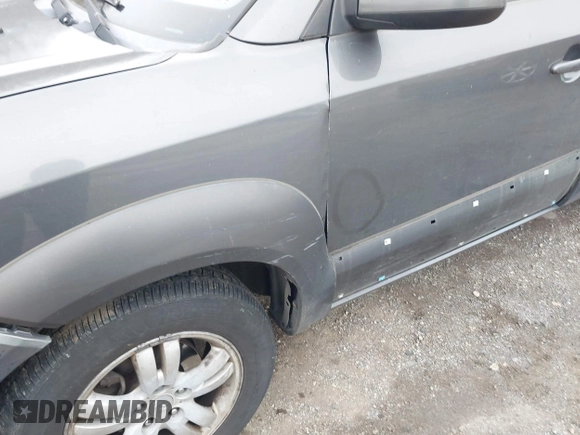 2007 Hyundai Tucson SE with VIN KM8JN12D57U522679, listed as a IAAI auction lot 41891506 with 223,190 mi miles. Bid and sale history available at carsss.com. Image 6.