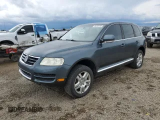 2005 Volkswagen Touareg z VIN WVGCM77L85D000754, wystawiony jako Copart lot #56183735 z przebiegiem 123 140 mil mil oraz Czysty tytuł • Clean title. Historia ofert i sprzedaży dostępna na DreamBid. Obrazek 1.
