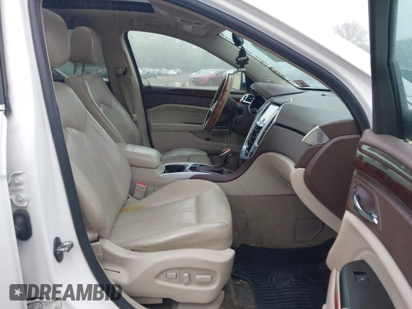 2013 Cadillac SRX Luxury Collection with VIN 3GYFNCE35DS542574, listed as a IAAI auction lot 42197843 with 137,319 mi miles. Bid and sale history available at carsss.com. Image 5.