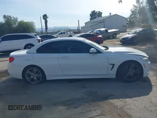 2015 BMW 4 Series 435i с VIN WBA3T3C58FP939536, выставлен на аукционе IAAI как лот 41849369 с пробегом 97 924 миль миль и . История ставок и продаж доступна на DreamBid. Изображение 13.