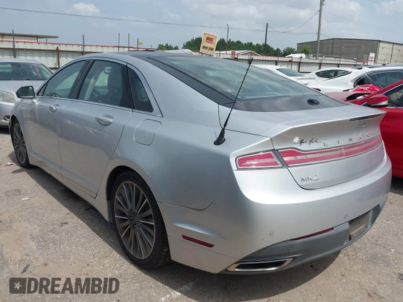 2014 Lincoln MKZ with VIN 3LN6L2GK4ER814286, listed as a IAAI auction lot 42657654 with 135,708 mi miles and . Bid and sale history available at DreamBid. Image 3.