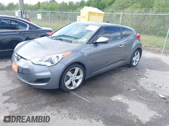 2013 Hyundai Veloster w/Black Int with VIN KMHTC6AD6DU169765, listed as a IAAI auction lot 41928516 with 130,708 mi miles and . Bid and sale history available at DreamBid. Image 17.