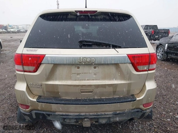2011 Jeep Grand Cherokee Laredo with VIN 1J4RR4GG9BC563065, listed as a IAAI auction lot 41798136 with 192,149 mi miles. Bid and sale history available at carsss.com. Image 16.