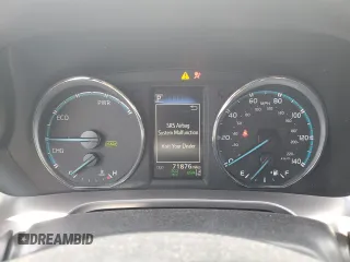 2018 Toyota RAV4 Hybrid SE with VIN JTMJJREVXJD212926, listed as a Copart auction lot 60215465 with 71,876 mi miles and Salvage title. Bid and sale history available at DreamBid. Image 9.