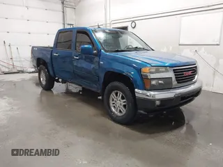 2011 GMC Canyon SLT with VIN 1GTH6NFP8B8115436, listed as a IAAI auction lot 41676023 with 148,478 mi miles. Bid and sale history available at carsss.com. Image 1.