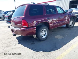 2002 Dodge Durango SLT with VIN 1B4HS48N42F142160, listed as a IAAI auction lot 41878384 with 201,581 mi miles and . Bid and sale history available at DreamBid. Image 4.