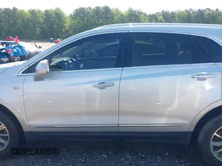 2017 Cadillac XT5 Luxury FWD z VIN 1GYKNBRS3HZ223077, wystawiony jako IAAI lot #42091584 z przebiegiem 154 664 mil mil oraz . Historia ofert i sprzedaży dostępna na DreamBid. Obrazek 14.