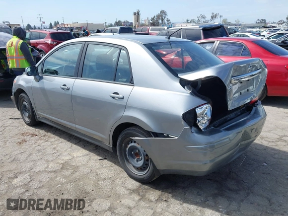 2011 Nissan Versa 1.8 S with VIN 3N1BC1AP0BL423655, listed as a IAAI auction lot 41816518 with 89,862 mi miles. Bid and sale history available at carsss.com. Image 3.