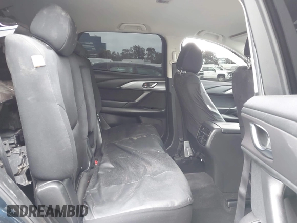 2016 Mazda CX-9 Sport with VIN JM3TCABY3G0123239, listed as a IAAI auction lot 42570700 with 119,414 mi miles and . Bid and sale history available at DreamBid. Image 8.