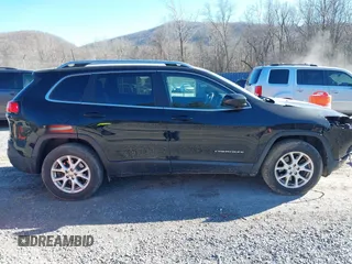 2018 Jeep Cherokee Latitude with VIN 1C4PJMCB1JD589473, listed as a IAAI auction lot 41665630 with 106,371 mi miles and . Bid and sale history available at DreamBid. Image 13.