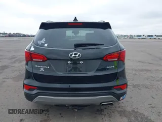 2017 Hyundai Santa Fe Sport 2.4L with VIN 5NMZU3LB1HH044093, listed as a IAAI auction lot 42026250 with 92,077 mi miles. Bid and sale history available at carsss.com. Image 16.