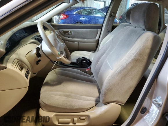 2000 Toyota Avalon XL with VIN 4T1BF28B1YU033159, listed as a Copart auction lot 52796755 with 247,062 mi miles and Salvage Title. Bid and sale history available at DreamBid. Image 7.