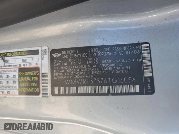 2006 MINI Convertible with VIN WMWRF33576TG16056, listed as a Copart auction lot 63127705 with 108,654 mi miles and Salvage title. Bid and sale history available at DreamBid. Image 12.