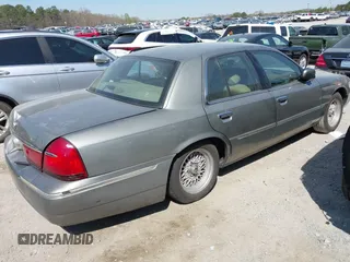 2001 Mercury Grand Marquis LS with VIN 2MEFM75W21X664449, listed as a IAAI auction lot 41898463 with 290,047 mi miles and . Bid and sale history available at DreamBid. Image 4.