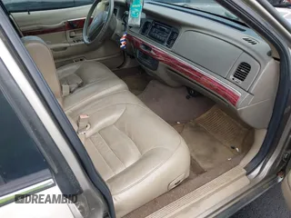 2001 Mercury Grand Marquis LS z VIN 2MEFM75W11X610723, wystawiony jako IAAI lot #42208567 z przebiegiem 190 397 mil mil oraz . Historia ofert i sprzedaży dostępna na DreamBid. Obrazek 5.