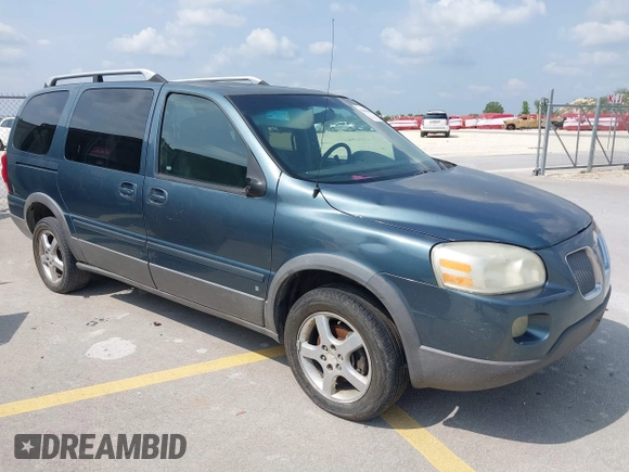 2006 Pontiac Montana SV6 with VIN 1GMDV33L66D211615, listed as a IAAI auction lot 42004609 with 264,541 mi miles. Bid and sale history available at carsss.com. Image 1.