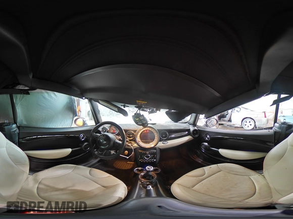 2013 MINI Convertible S with VIN WMWZP3C51DT297891, listed as a Copart auction lot 56745065 with 101,292 mi miles and Salvage title. Bid and sale history available at DreamBid. Image 15.