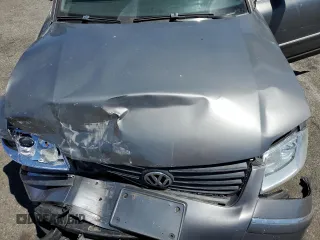 2005 Volkswagen Passat GLX z VIN WVWTU63B95E085836, wystawiony jako Copart lot #67782394 z przebiegiem 125 315 mil mil oraz Szkoda całkowita • Salvage title. Historia ofert i sprzedaży dostępna na DreamBid. Obrazek 11.