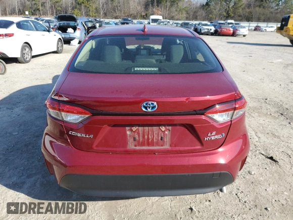2023 Toyota Corolla Hybrid LE with VIN JTDBCMFE1PJ013094, listed as a Copart auction lot 47686665 with 27,190 mi miles and Salvage Title. Bid and sale history available at carsss.com. Image 6.