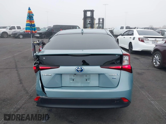 2022 Toyota Prius L Eco with VIN JTDKAMFU9N3186859, listed as a IAAI auction lot 41486941 with 122,665 mi miles and . Bid and sale history available at DreamBid. Image 16.