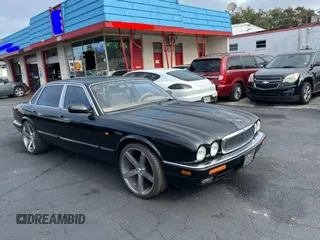 1995 Jaguar XJ with VIN SAJHX174XSC738291, listed as a Copart auction lot 87054224 with 71,076 mi miles and Clean title. Bid and sale history available at DreamBid. Image 1.