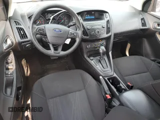 2018 Ford Focus SE z VIN 1FADP3F2XJL228407, wystawiony jako Copart lot #59254415 z przebiegiem 75 241 mil mil oraz Szkoda całkowita • Salvage title. Historia ofert i sprzedaży dostępna na DreamBid. Obrazek 8.