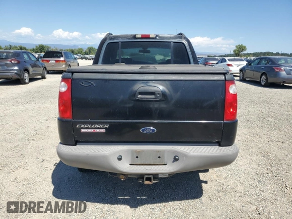 2001 Ford Explorer Sport Trac with VIN 1FMZU77E21UC32983, listed as a Copart auction lot 62192365 with 179,611 mi miles and Salvage title. Bid and sale history available at DreamBid. Image 6.