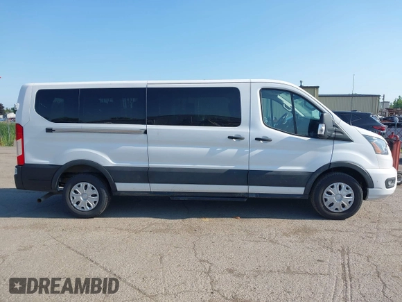 2023 Ford Transit Passenger XL with VIN 1FBAX2YG3PKA90941, listed as a IAAI auction lot 42472270 with 43,141 mi miles and . Bid and sale history available at DreamBid. Image 13.