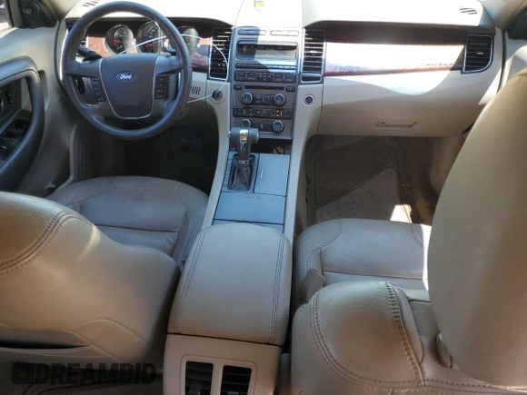 2011 Ford Taurus SEL z VIN 1FAHP2EW6BG176994, wystawiony jako Copart lot #56154735 z przebiegiem 211 017 mil mil oraz Szkoda całkowita • Salvage title. Historia ofert i sprzedaży dostępna na DreamBid. Obrazek 8.