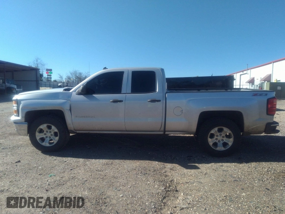 2014 Chevrolet Silverado 1500 LT with VIN 1GCVKREC7EZ120159, listed as a IAAI auction lot 41191282 with 206,836 mi miles and . Bid and sale history available at DreamBid. Image 14.