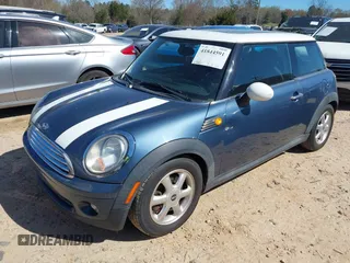 2009 MINI Cooper Hardtop with VIN WMWMF33549TW79871, listed as a IAAI auction lot 41844591 with 236,255 mi miles. Bid and sale history available at carsss.com. Image 2.