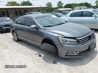 2016 Volkswagen Passat SE with VIN 1VWBS7A3XGC039432, listed as a IAAI auction lot 42422371 with 130,461 mi miles and . Bid and sale history available at DreamBid. Image 1.