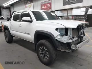 2022 Toyota Tacoma SR with VIN 3TMCZ5AN5NM480311, listed as a IAAI auction lot 42542600 with 43,297 mi miles and . Bid and sale history available at DreamBid. Image 1.