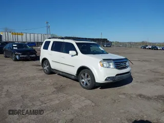 2012 Honda Pilot Touring with VIN 5FNYF4H98CB057659, listed as a IAAI auction lot 41927990 with 140,000 mi miles. Bid and sale history available at carsss.com. Image 1.