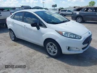 2017 Ford Fiesta SE z VIN 3FADP4BJXHM147290, wystawiony jako IAAI lot #42071340 z przebiegiem 122 142 mil mil oraz . Historia ofert i sprzedaży dostępna na DreamBid. Obrazek 1.