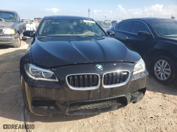 2014 BMW M5 with VIN WBSFV9C52ED593005, listed as a Copart auction lot 73960374 with 71,154 mi miles and Salvage Title. Bid and sale history available at carsss.com. Image 5.