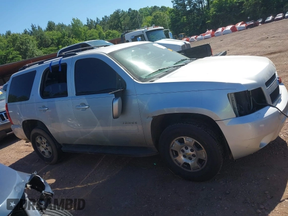 2014 Chevrolet Tahoe LT with VIN 1GNSCBE00ER147899, listed as a IAAI auction lot 42322761 with 299,342 mi miles and . Bid and sale history available at DreamBid. Image 13.