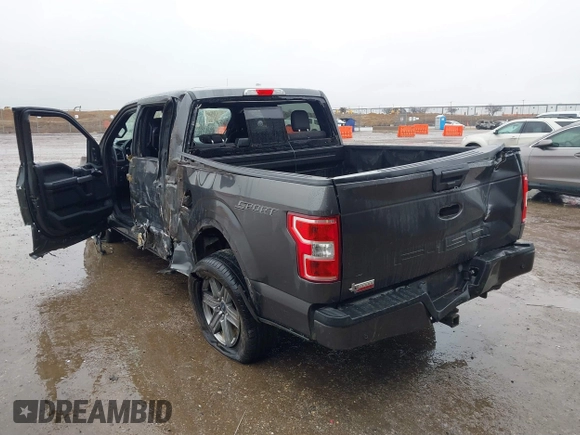 2019 Ford F-150 XL with VIN 1FTEW1C56KKC31025, listed as a IAAI auction lot 41452618 with 153,422 mi miles and . Bid and sale history available at DreamBid. Image 3.