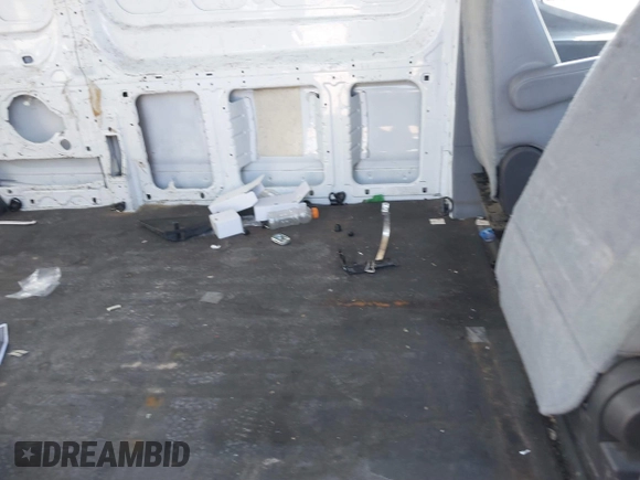 2015 Ford Transit Cargo with VIN 1FTNE2CMXFKA15572, listed as a IAAI auction lot 41566311 with 276,750 mi miles and . Bid and sale history available at carsss.com. Image 8.