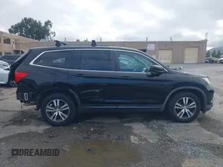 2016 Honda Pilot EX-L z VIN 5FNYF6H52GB048437, wystawiony jako IAAI lot #42207142 z przebiegiem 165 345 mil mil oraz . Historia ofert i sprzedaży dostępna na DreamBid. Obrazek 14.