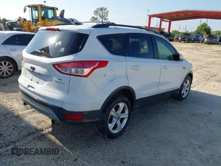 2013 Ford Escape SE with VIN 1FMCU0GX1DUB71466, listed as a IAAI auction lot 42329136 with 103,763 mi miles and . Bid and sale history available at DreamBid. Image 4.