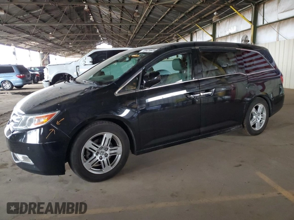 2012 Honda Odyssey Touring with VIN 5FNRL5H94CB026539, listed as a Copart auction lot 48925605 with 88,381 mi miles and Salvage Title. Bid and sale history available at DreamBid. Image 1.