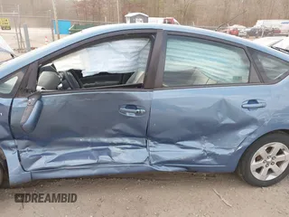 2009 Toyota Prius with VIN JTDKB20UX97831124, listed as a IAAI auction lot 40897213 with 247,215 mi miles and . Bid and sale history available at DreamBid. Image 6.