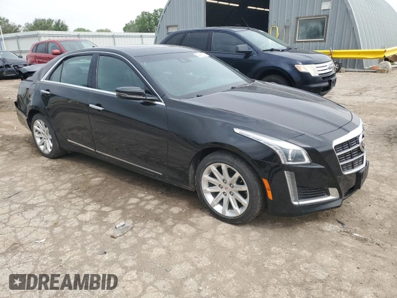 2014 Cadillac CTS Luxury AWD with VIN 1G6AX5S35E0190361, listed as a Copart auction lot 54497655 with 32,664 mi miles and Salvage title. Bid and sale history available at DreamBid. Image 4.