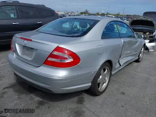 2004 Mercedes-Benz CLK-Class 5.0L with VIN WDBTJ75J34F071716, listed as a IAAI auction lot 41818093 with 100,142 mi miles. Bid and sale history available at carsss.com. Image 4.