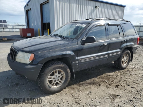 1999 Jeep Grand Cherokee Limited with VIN 1J4GW68N4XC679841, listed as a Copart auction lot 59760015 with 155,366 mi miles and Salvage title. Bid and sale history available at DreamBid. Image 1.