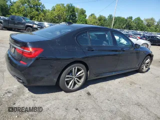 2017 BMW 7 Series 740i xDrive with VIN WBA7E4C54HGU99710, listed as a Copart auction lot 69572544 with 0 mi miles and Salvage Title. Bid and sale history available at carsss.com. Image 3.