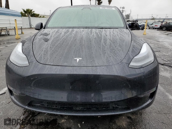 2025 Tesla Model Y Long Range with VIN 7SAYGAEE3SF216635, listed as a Copart auction lot 44614555 with 400 mi miles and Salvage Title. Bid and sale history available at DreamBid. Image 5.