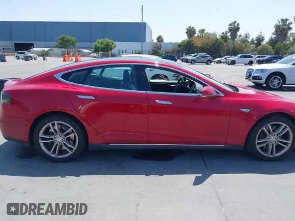 2014 Tesla Model S 60 with VIN 5YJSA1S11EFP33278, listed as a IAAI auction lot 42441781 with Not provided miles and . Bid and sale history available at DreamBid. Image 13.